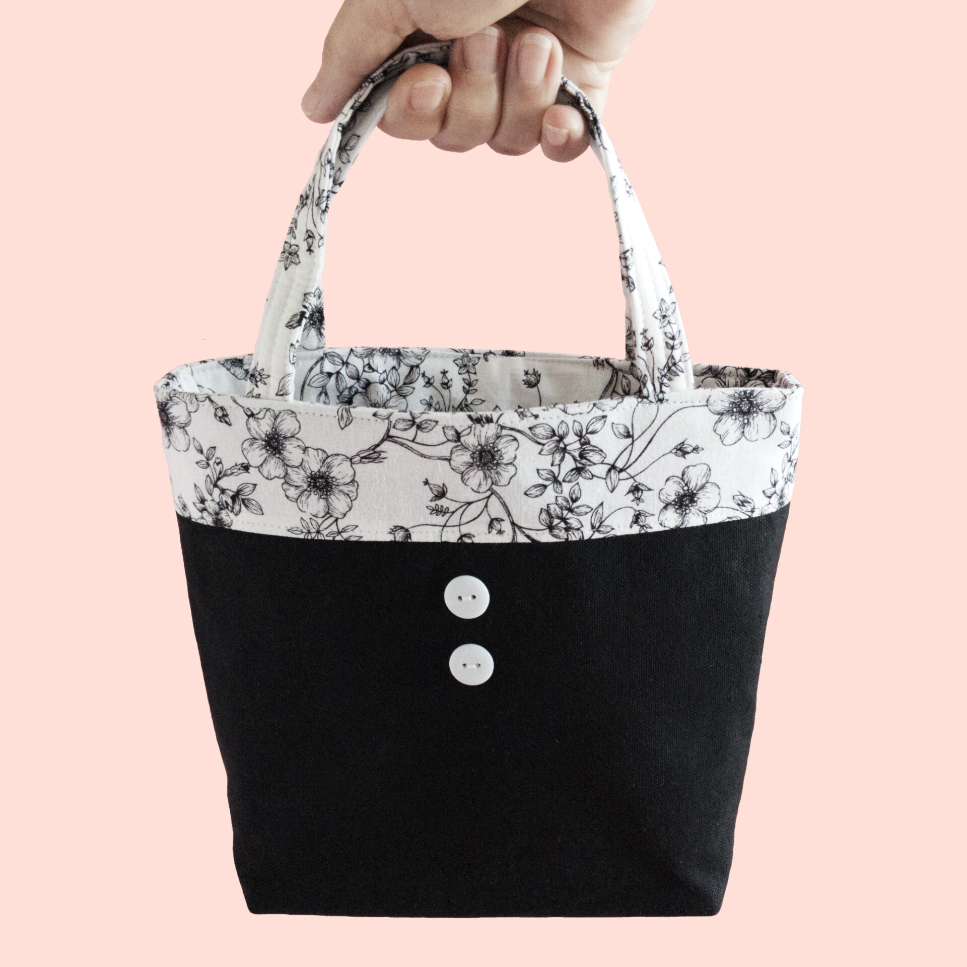 Hand Carrying the Bag